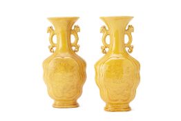 A PAIR OF INCISED YELLOW GLAZED DRAGON VASES