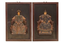 A PAIR OF HARDSTONE INLAID PANELS OF AN EMPEROR AND EMPRESS