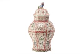 A LARGE ENAMELLED OCTAGONAL BALUSTER PORCELAIN JAR AND COVER