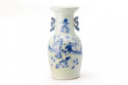 A BLUE AND WHITE TWIN HANDLED PORCELAIN VASE