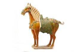 A LARGE SANCAI GLAZED MODEL OF A HORSE