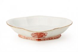 AN IRON RED PORCELAIN 'DRAGON' DISH