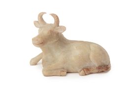 A CARVED STONE MODEL OF A WATER BUFFALO