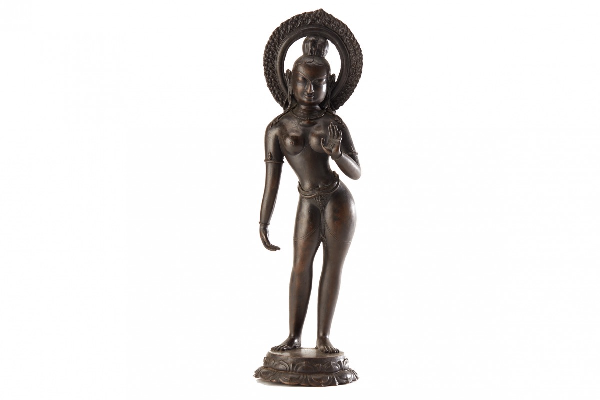 A LARGE INDIAN BRONZE FIGURE OF A FEMALE DEITY