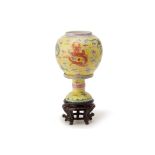 A YELLOW GROUND FAMILLE ROSE PORCELAIN LANTERN