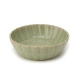 A SMALL PETAL LOBED CELADON BOWL OR WASHER