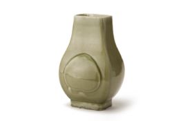 A CELADON PORCELAIN FANGHU VASE