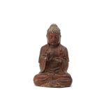 A CARVED AND LACQUERED WOOD FIGURE OF BUDDHA