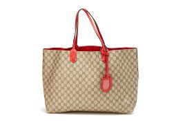 A GUCCI MONOGRAM GG REVERSIBLE LEATHER TOTE BAG