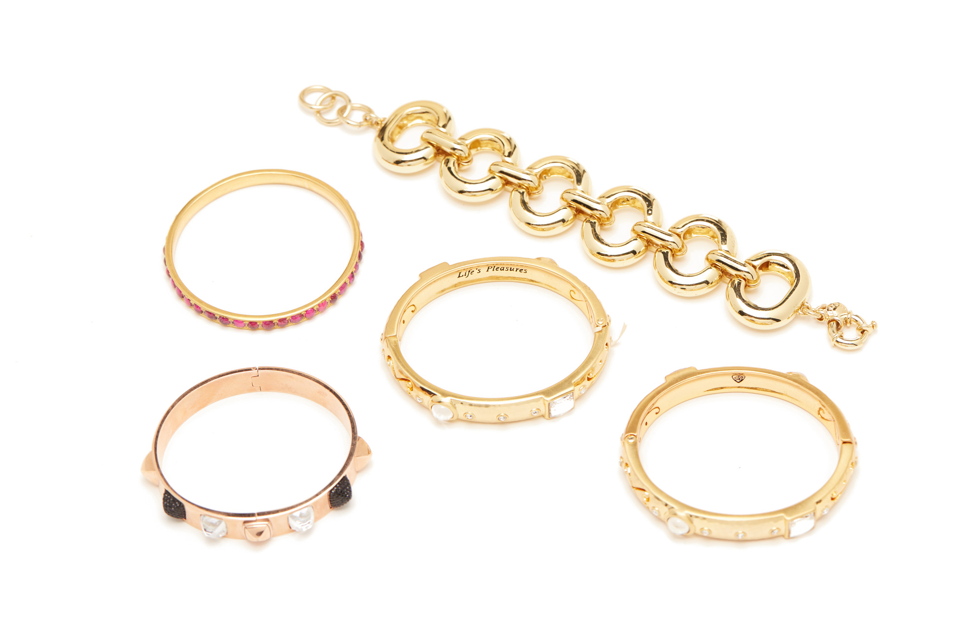 FIVE GOLD TONE BRACELETS AND CUFFS