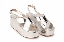 A PAIR OF PRADA METALLIC SILVER PLATFORM SANDALS EU 40