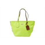 A COACH NEON YELLOW 'TAXI' TOTE BAG