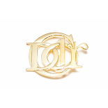 A CHRISTIAN DIOR GOLD-TONE VINTAGE BROOCH