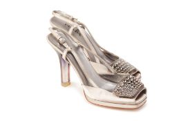 A PAIR OF PRADA SILVER GREY HEELS EU 39