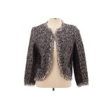 AN OSCAR DE LA RENTA BLACK AND WHITE KNITTED JACKET