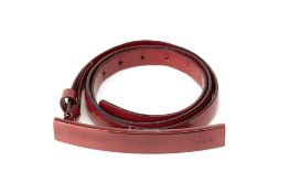 A GUCCI WINE RED LEATHER BELT