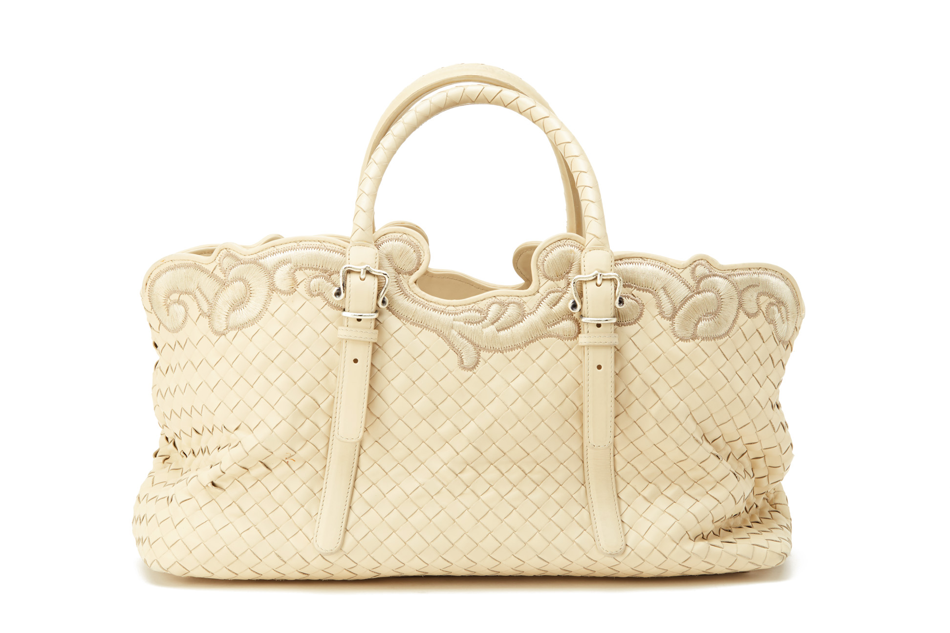 A BOTTEGA VENETA WOVEN LEATHER CREAM HANDBAG