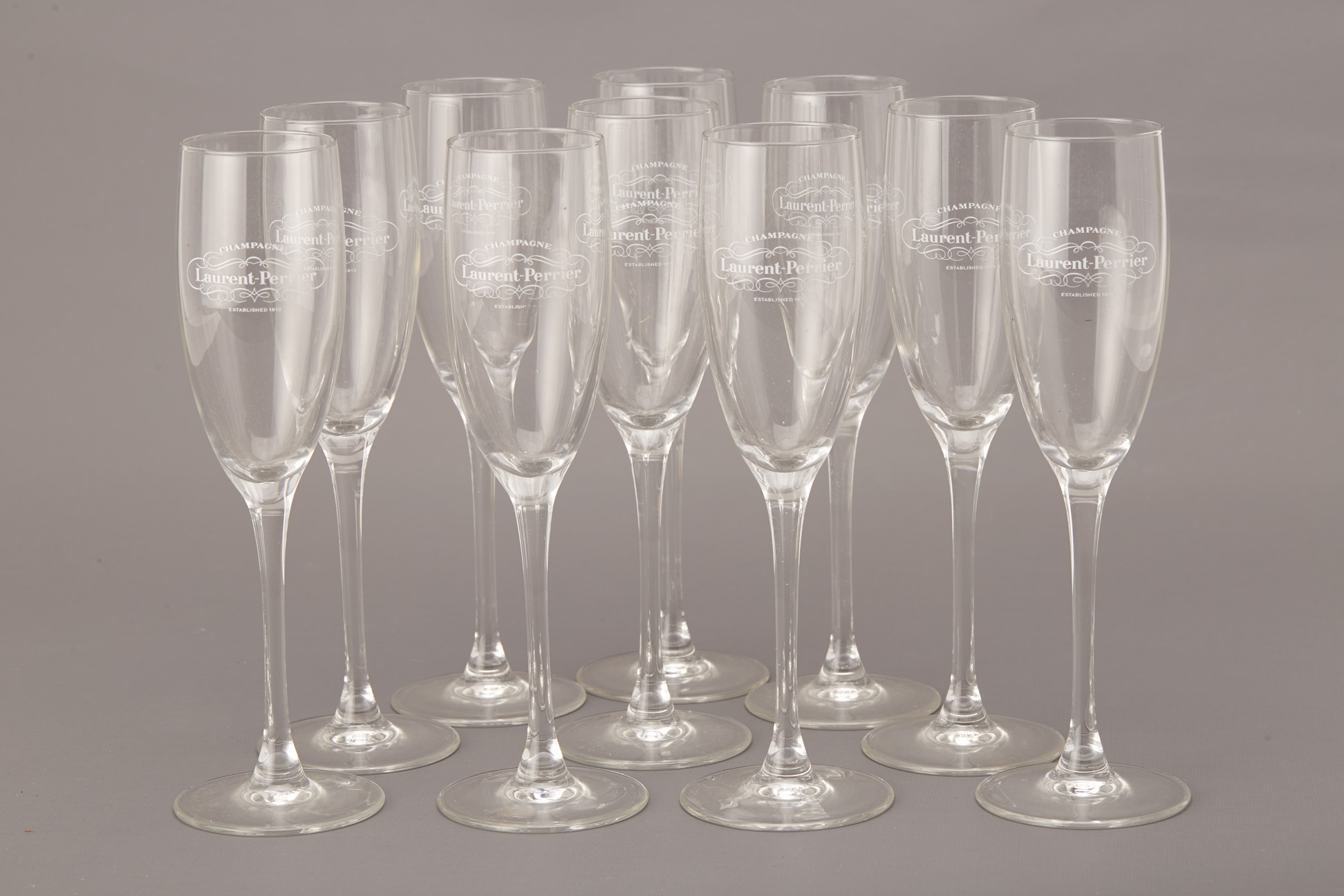 A SET OF TEN LAURENT PERRIER CHAMPAGNE FLUTES