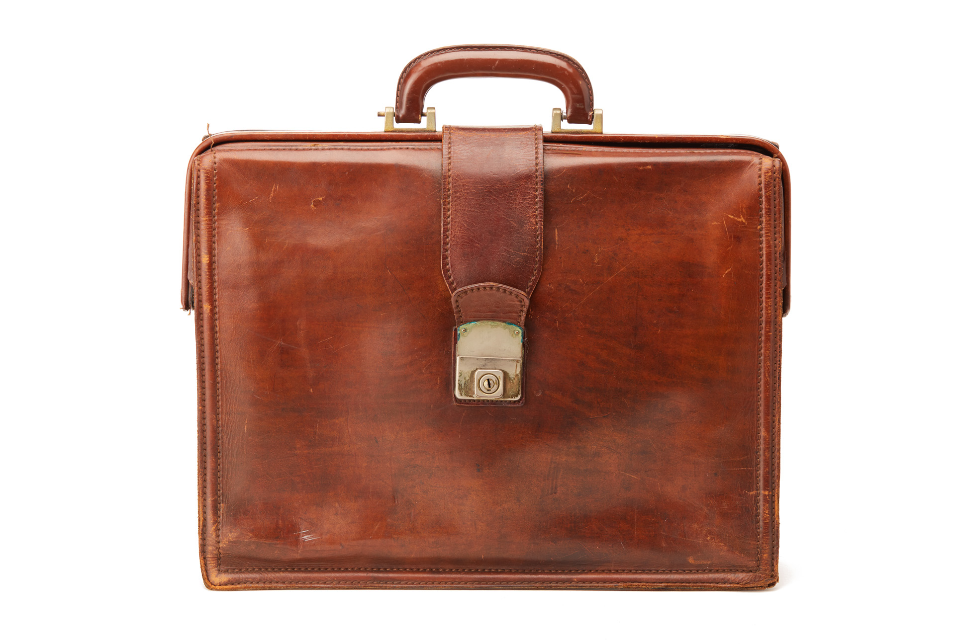 A DARK BROWN VINTAGE LEATHER BRIEFCASE