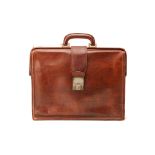 A DARK BROWN VINTAGE LEATHER BRIEFCASE