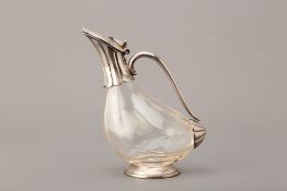 A SILVER PLATE MOUNTED DUCK FORM CLARET JUG