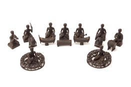 A SET OF 14 METALWARE MODELS OF MUSICIANS WITH INSTRUMENTS