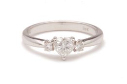 A WHITE GOLD DIAMOND THREE STONE RING