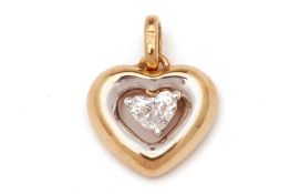 A HEART-SHAPED YELLOW GOLD DIAMOND PENDANT