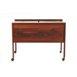 A MID-CENTURY DANISH ROSEWOOD BAR CART