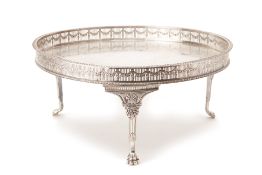 A CIRCULAR SILVER PLATED GALLERY TRAY