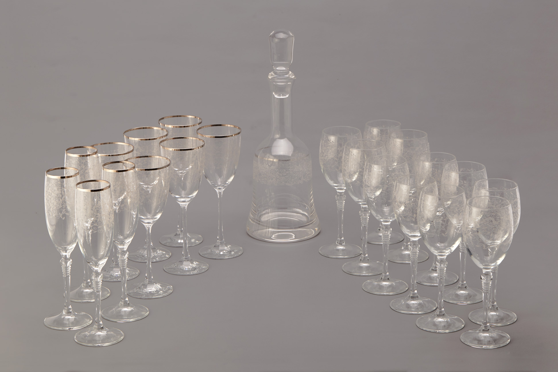 A PART SERVICE OF GLASSWARE WITH FOLIATE DECORATION
