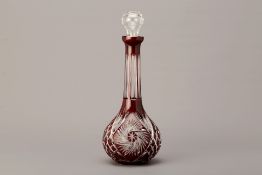 A RUBY FLASHED AND CUT GLASS DECANTER