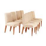 A SET OF EIGHT UPHOLSTERED DINING CHAIRS