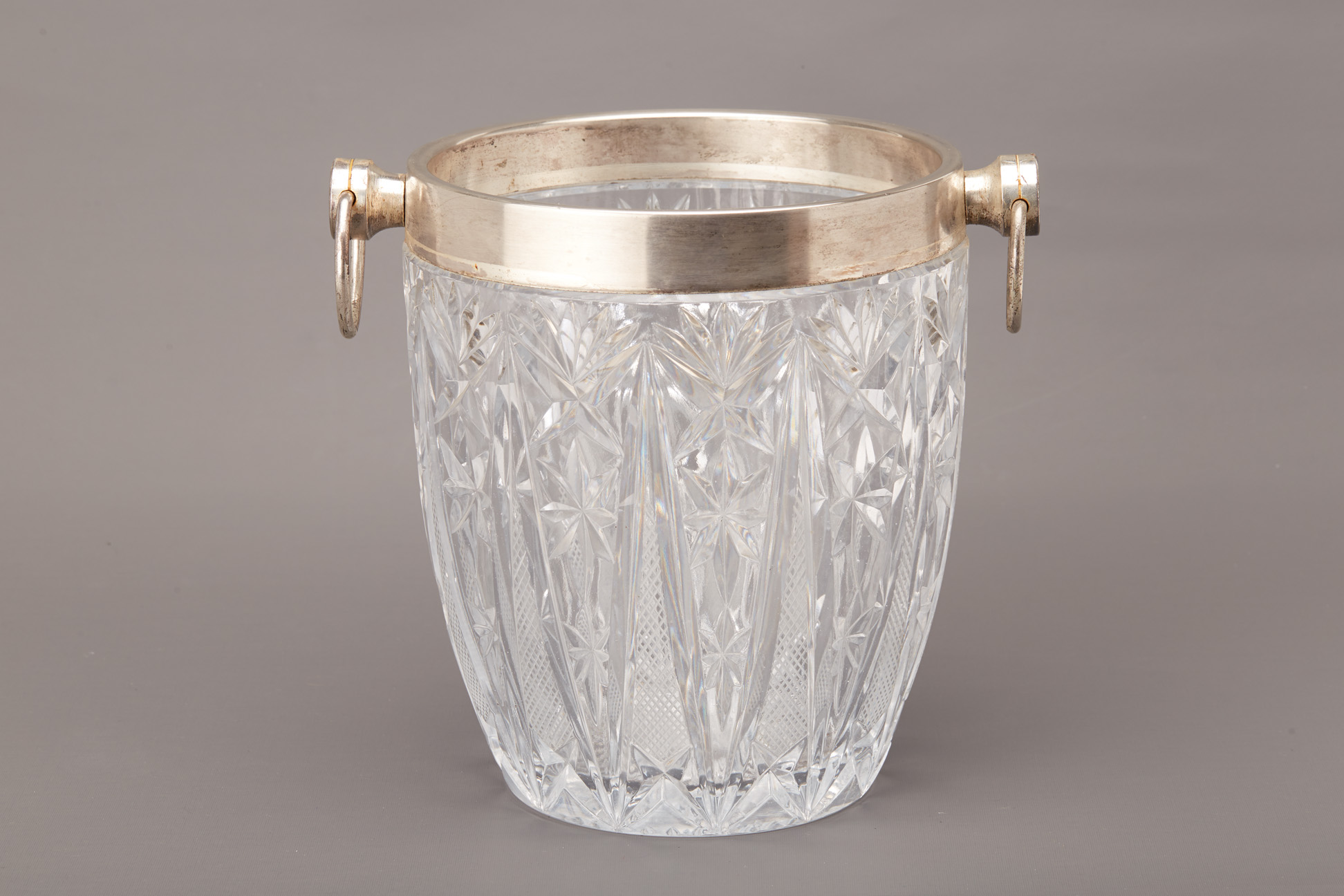 A SILVER PLATE MOUNTED CUT GLASS WINE COOLER