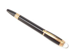 A MONTBLANC STARWALKER RED GOLD BALLPOINT PEN