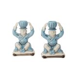 A PAIR OF CHINESE PORCELAIN FIGURAL CANDLESTICKS