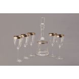 A COSMO VERSACE DECANTER AND WINE GLASSES