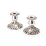 A PAIR OF AMERICAN SILVER PLATED CANDLESTICKS