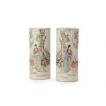 A PAIR OF CHINESE FAMILLE ROSE PORCELAIN CYLINDER VASES