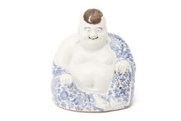 A BLUE AND WHITE PORCELAIN FIGURE OF BUDAI