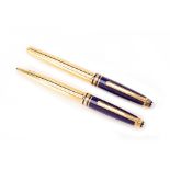 A MONTBLANC RAMSES II SILVER-GILT AND LAPIS PEN SET