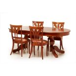 A GRANGE CHERRY WOOD EXTENDING DINING TABLE AND FOUR CHAIRS