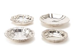 FOUR SIMILAR SILVER PLATED BOWLS
