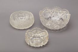 A GROUP OF THREE CUT GLASS BOWLS