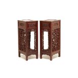 A PAIR OF TALL CHINESE CARVED SIDE TABLES