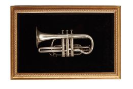 A FRAMED CORNET