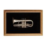 A FRAMED CORNET