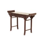 A CARVED HARDWOOD ALTAR FORM CONSOLE TABLE