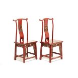 A PAIR OF CHINESE RED PAINTED CHAIRS