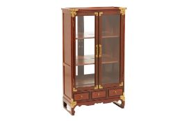 AN ORIENTAL GLAZED DISPLAY CABINET